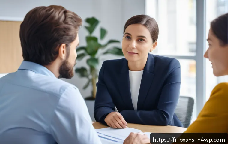 비즈니스 출구 전략과 인력 관리 전략 - A professional office scene showing a thoughtful HR manager and an employee having an open and trans...